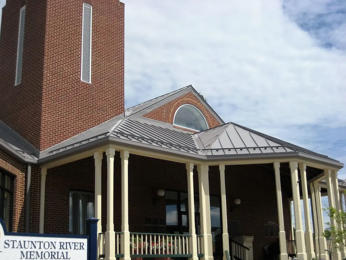 Skilled roofing craftsmen working on a residential roof in Downtown Greensboro
